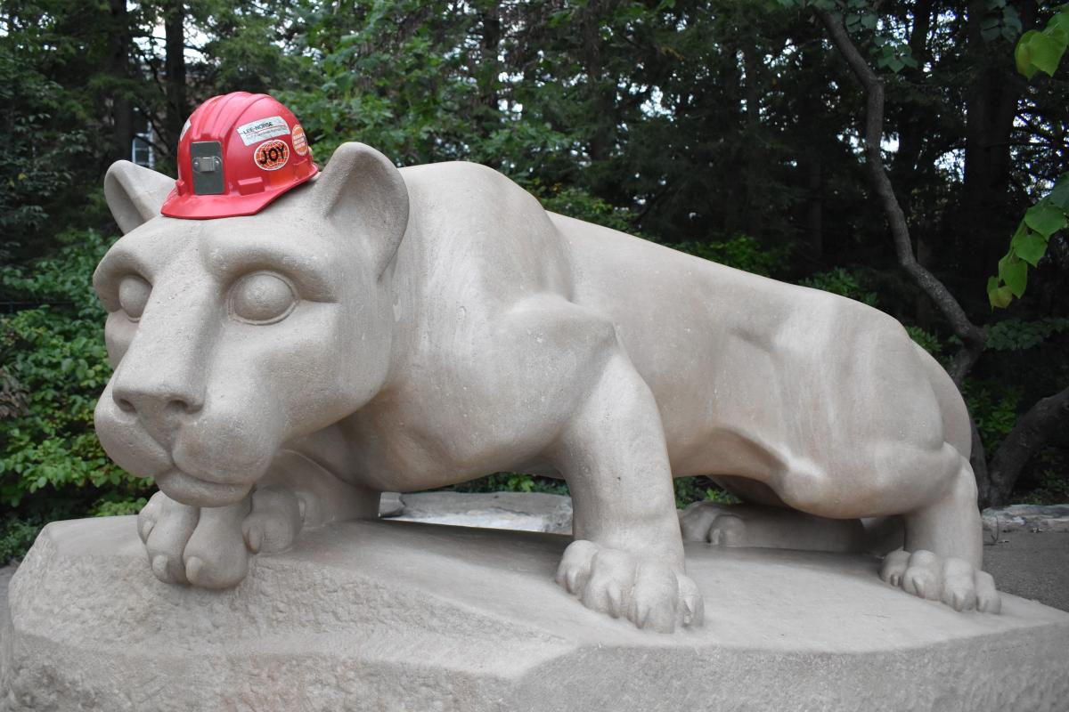 Lion Shrine with hard hat