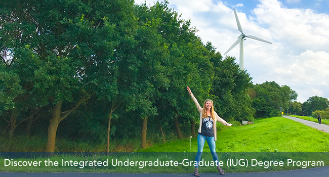 Student by wind turbine