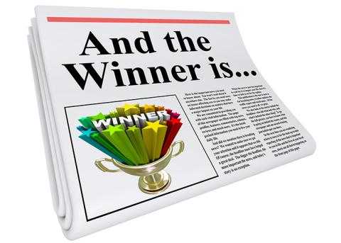 newspaper image with the words, "And the winner is..."
