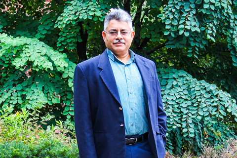 Sanjay Srinivasan standing outside