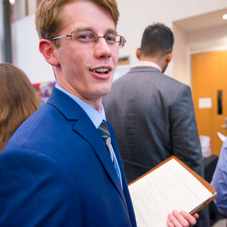 Student with notebook