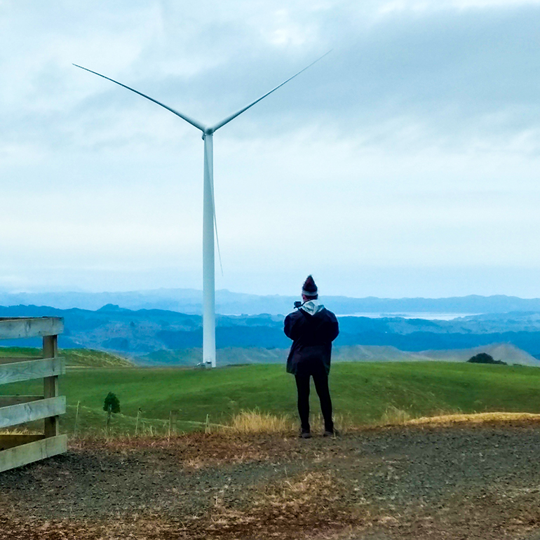 Student by Wind Turbine